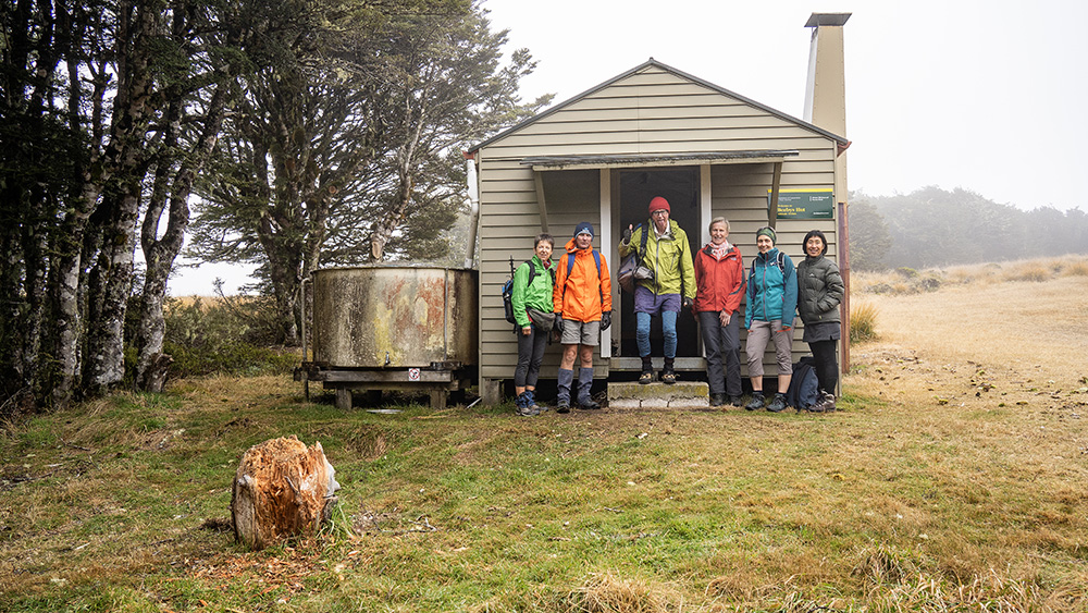 Trampers at Beebys Hut, Mt Richmond Forest Park